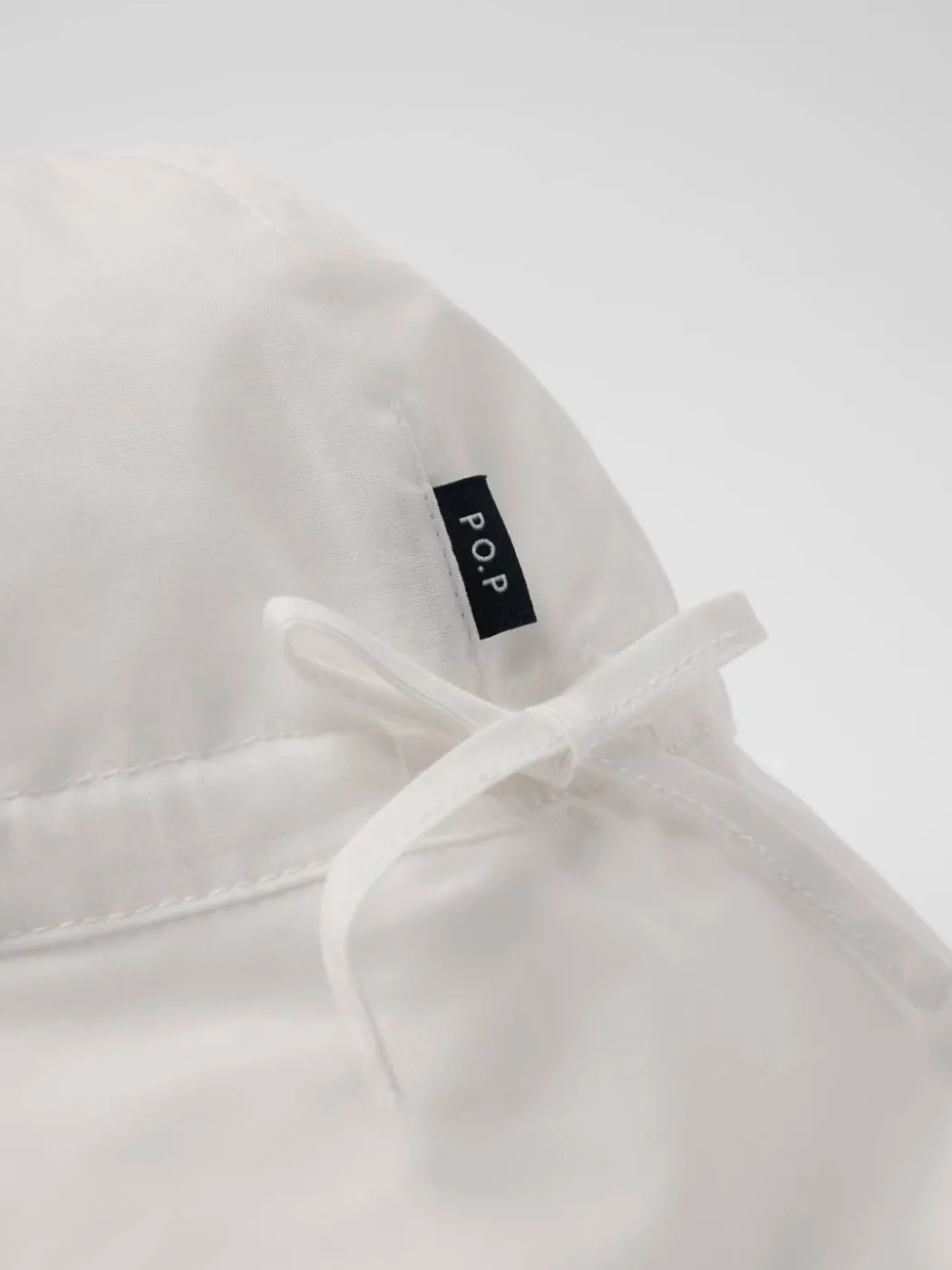 Vevd UV-cap med ører